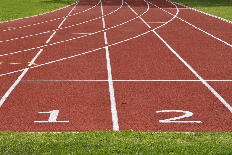 Lanes on an athletics track labelled 1 and 2.